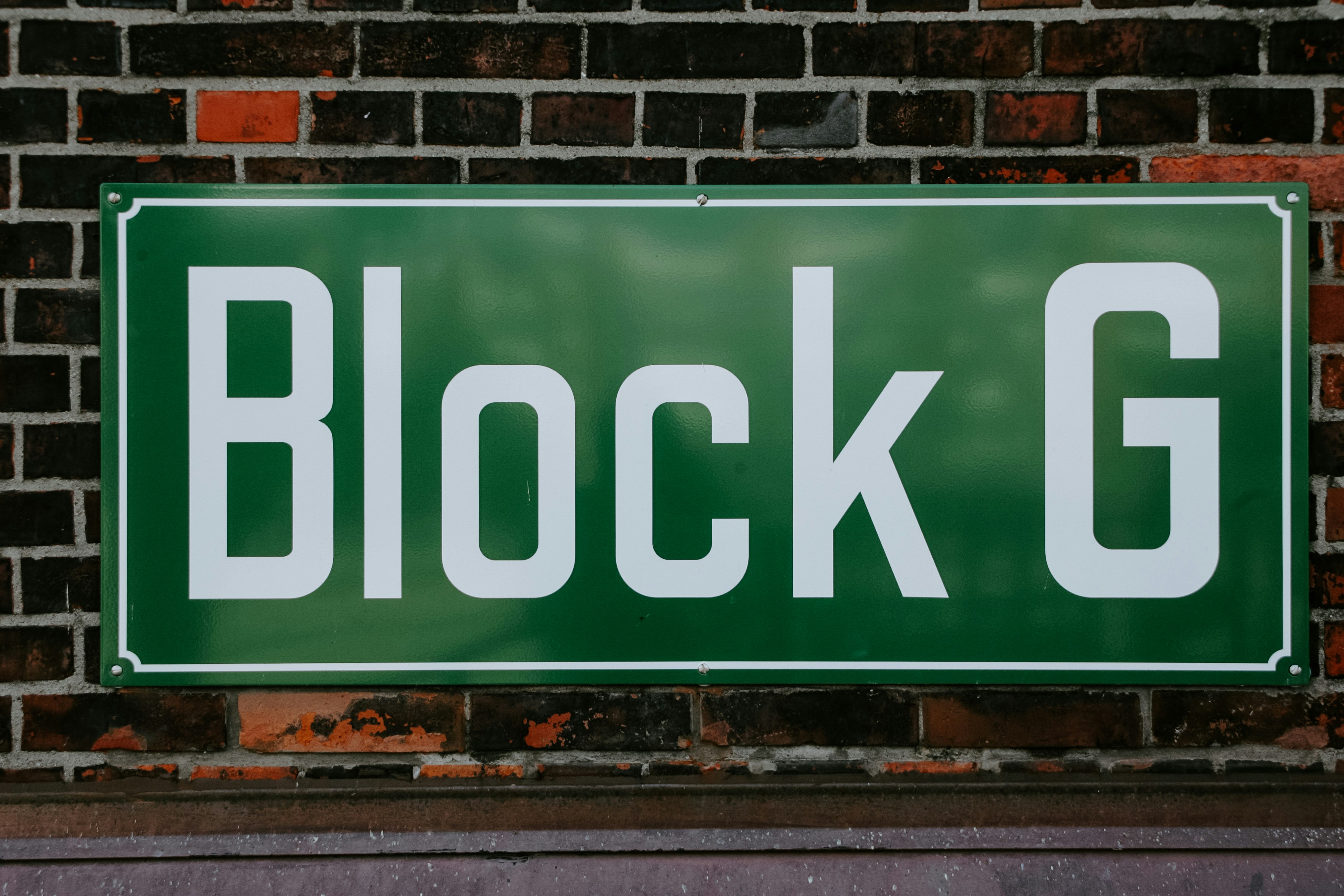 Block G sign on brick wall